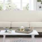 Modern Three Seater Upholstered Sofa In Off White Colour